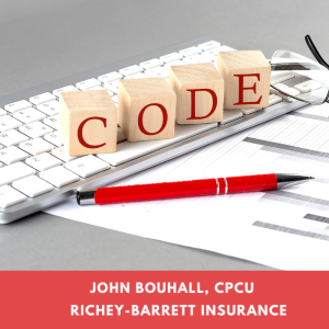 Wooden blocks spelling "CODE" rest on a keyboard, next to a red pen and eyeglasses. Below, text reads: "John Bouhall, CPCU Richey-Barrett Insurance."